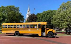 Students arriving on a school bus for their field trip to the Museum
