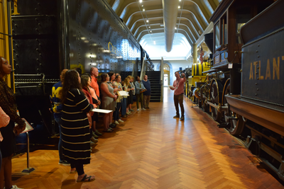 Educators in Residence hearing more about trains in Henry Ford Museum of American Innovation