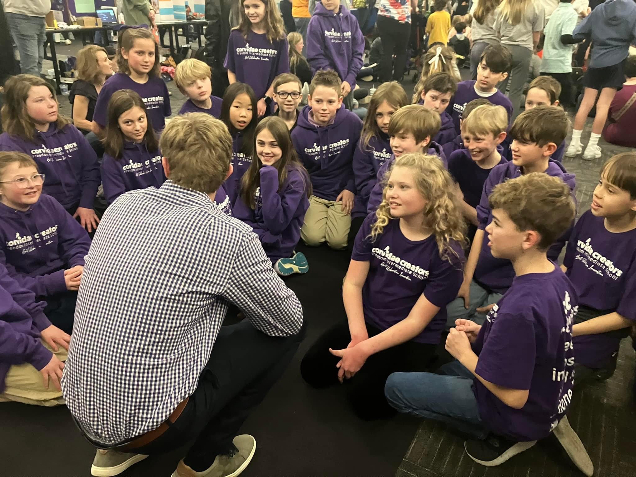 Maddox engages with young inventors during the Tennessee Invention Convention.